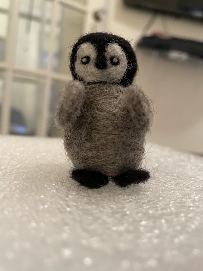 Needlefelted penguin named Pebbles